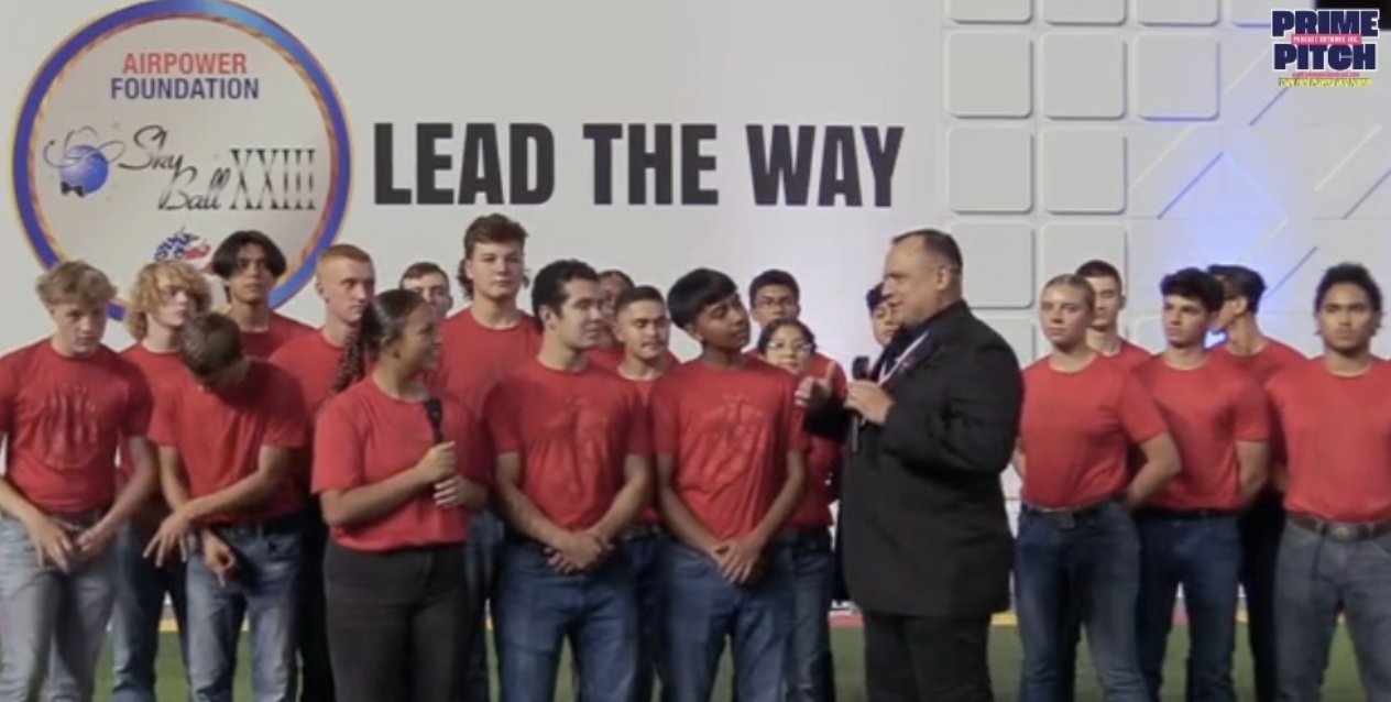 Eric Rush on stage with new Marine recruits at the Airpower Foundation