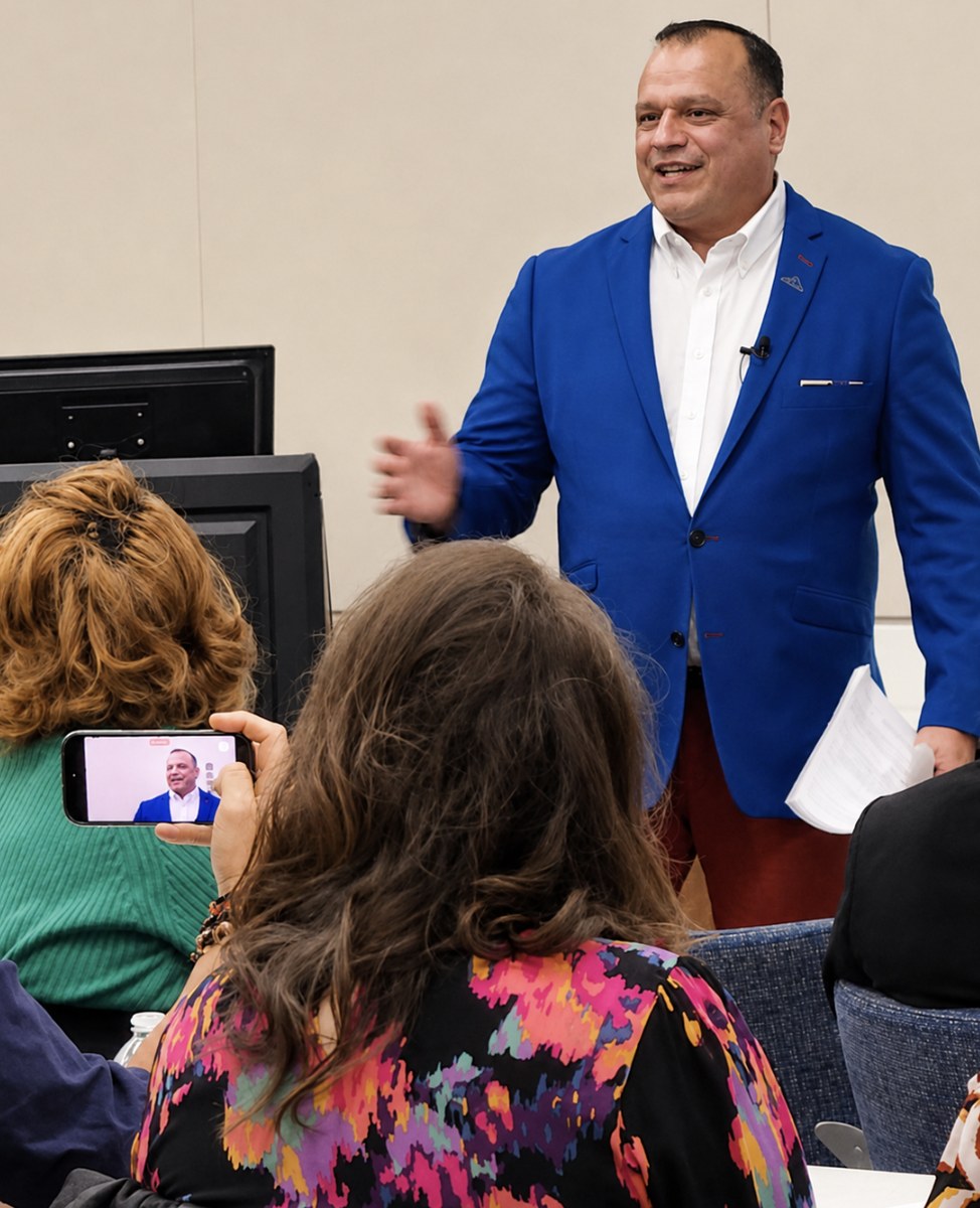 Eric Rush speaking to a live audience