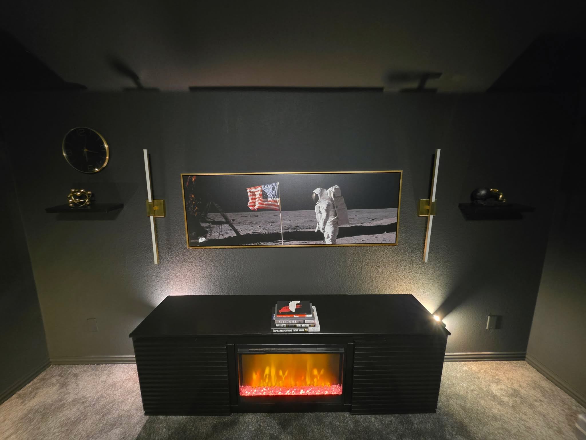 Apollo 11 print above the fireplace